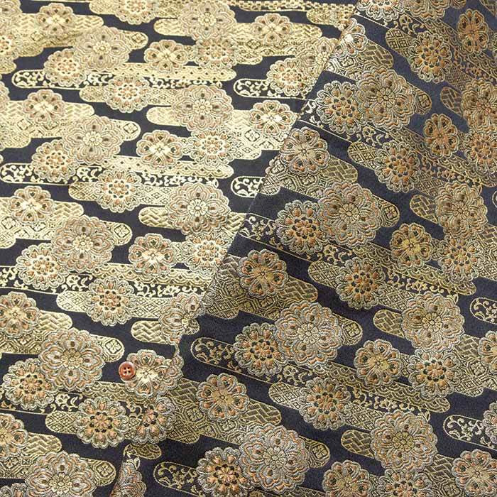 gold brocade flowers floating in the air - nomura tailor