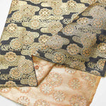 gold brocade flowers floating in the air - nomura tailor