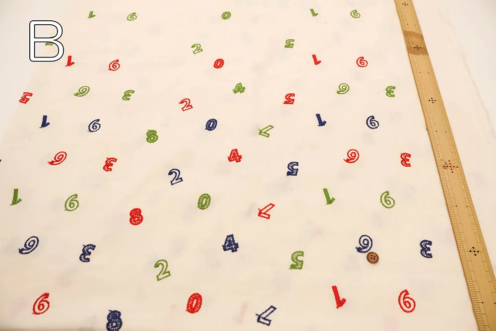 Cotton Cambric Embroidered Fabric 数字 - nomura tailor